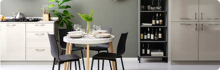 Modern white dining area with black chairs
